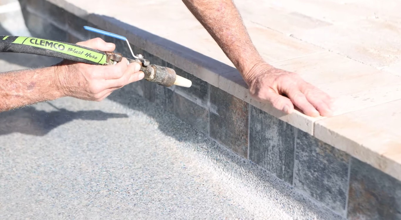 Professional pool tile cleaning service removing calcium and scale in Fontana, CA